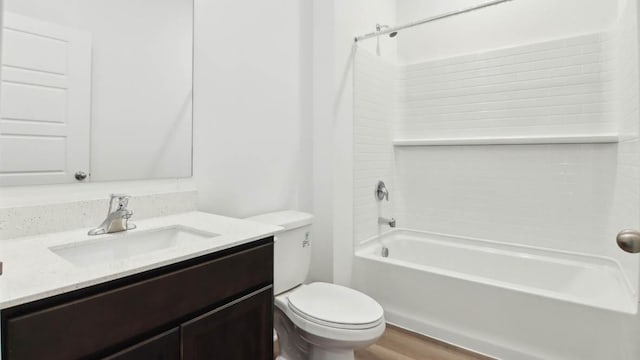 2275 Redwood Trl, Wonder Lake, IL 60097 - bathroom featuring vanity, washtub / shower combination, and wood finished floors