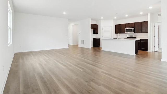 2275 Redwood Trl, Wonder Lake, IL 60097 - unfurnished living room with recessed lighting and light wood-style floors