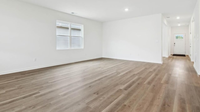 2275 Redwood Trl, Wonder Lake, IL 60097 - unfurnished room with wood finished floors and recessed lighting