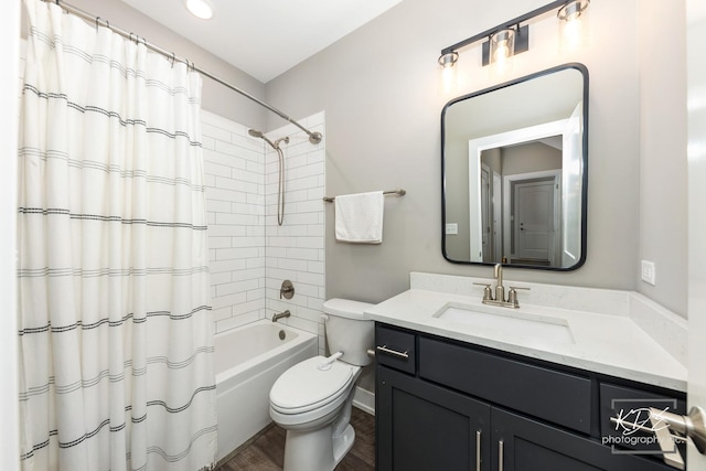 561 Sudbury Cir, Oswego, IL 60543 - full bathroom with vanity, shower / bath combo with shower curtain, and wood finished floors