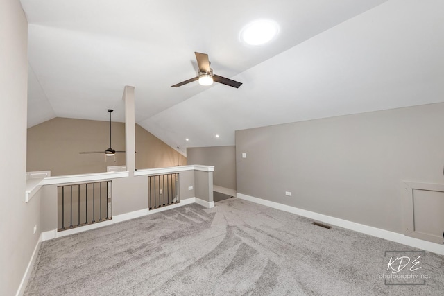 561 Sudbury Cir, Oswego, IL 60543 - additional living space with a ceiling fan, carpet floors, and vaulted ceiling
