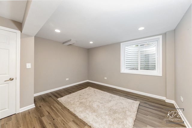 561 Sudbury Cir, Oswego, IL 60543 - empty room with wood finished floors and recessed lighting