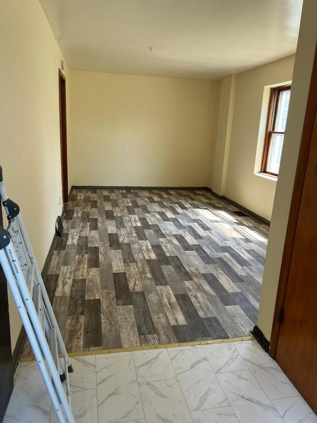 320 W Saint Paul St, Spring Valley, IL 61362 - spare room featuring marble look tile flooring