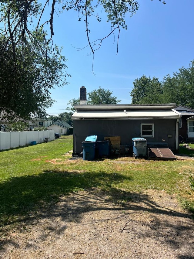 320 W Saint Paul St, Spring Valley, IL 61362 - rear view of property featuring a chimney
