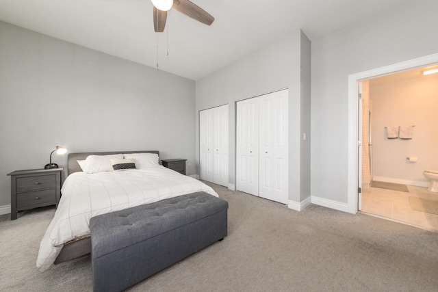 2409 W Catalpa Ave Unit 307, Chicago, IL 60625 - bedroom with two closets, carpet, ensuite bathroom, and ceiling fan