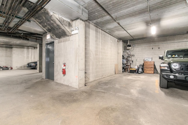 2409 W Catalpa Ave Unit 307, Chicago, IL 60625 - parking garage with concrete block wall