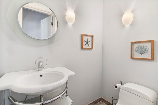 542 W Brompton Ave Unit 1S, Chicago, IL 60657 - half bathroom with toilet and a sink