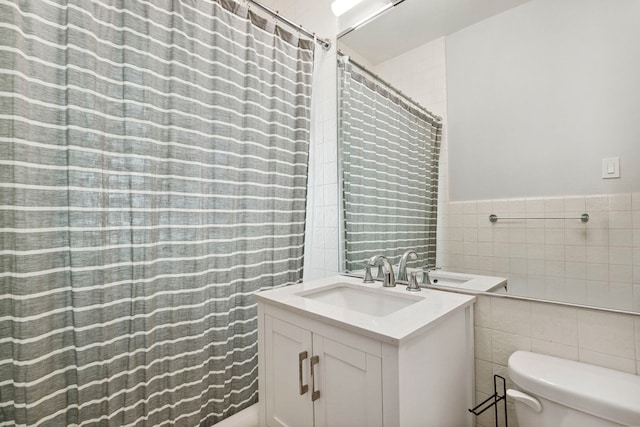 542 W Brompton Ave Unit 1S, Chicago, IL 60657 - full bathroom featuring vanity, tile walls, and a shower with shower curtain