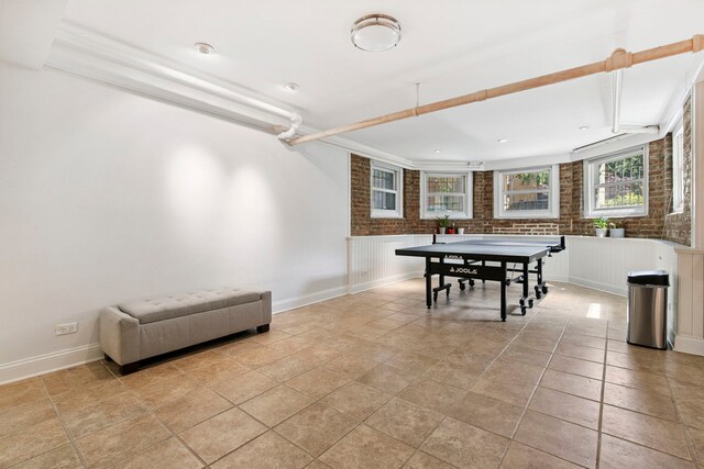 542 W Brompton Ave Unit 1S, Chicago, IL 60657 - game room with baseboards