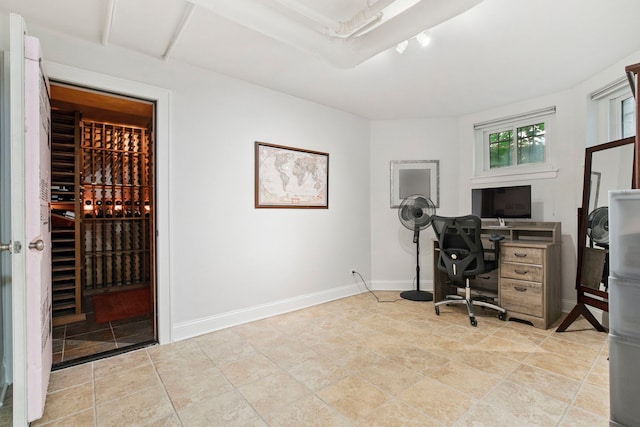 542 W Brompton Ave Unit 1S, Chicago, IL 60657 - office with baseboards and light stone finish flooring