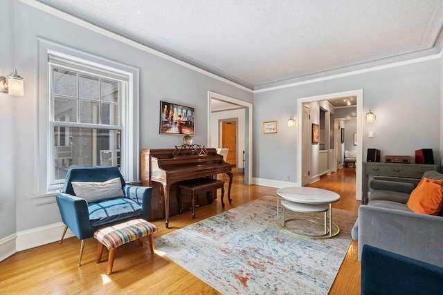 542 W Brompton Ave Unit 1S, Chicago, IL 60657 - living area featuring ornamental molding, wood finished floors, and a textured ceiling
