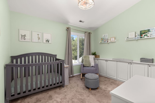 2408 Danbury Dr Unit A2, Woodridge, IL 60517 - bedroom featuring light colored carpet, a crib, and lofted ceiling