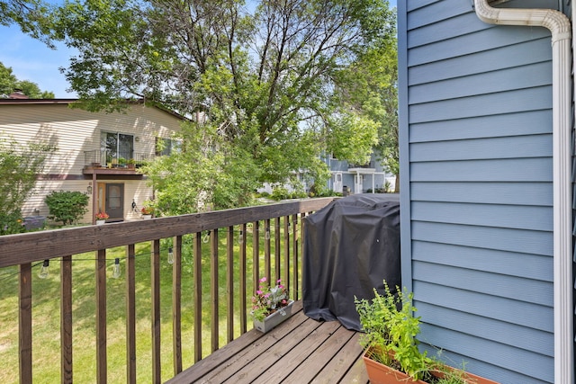 2408 Danbury Dr Unit A2, Woodridge, IL 60517 - wooden deck with grilling area and a lawn