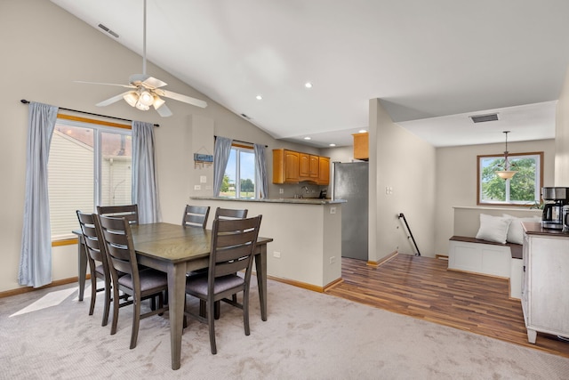 2408 Danbury Dr Unit A2, Woodridge, IL 60517 - dining space with a ceiling fan, lofted ceiling, light wood-style floors, recessed lighting, and light colored carpet