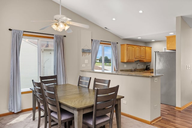 2408 Danbury Dr Unit A2, Woodridge, IL 60517 - dining space with vaulted ceiling, ceiling fan, and recessed lighting
