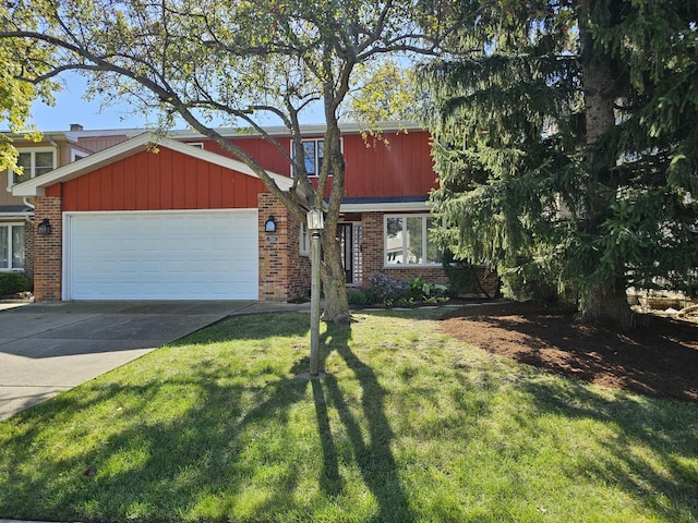 7215 Beckwith Rd, Morton Grove, IL 60053 - view of front facade with brick siding, a garage, concrete driveway, and a front yard