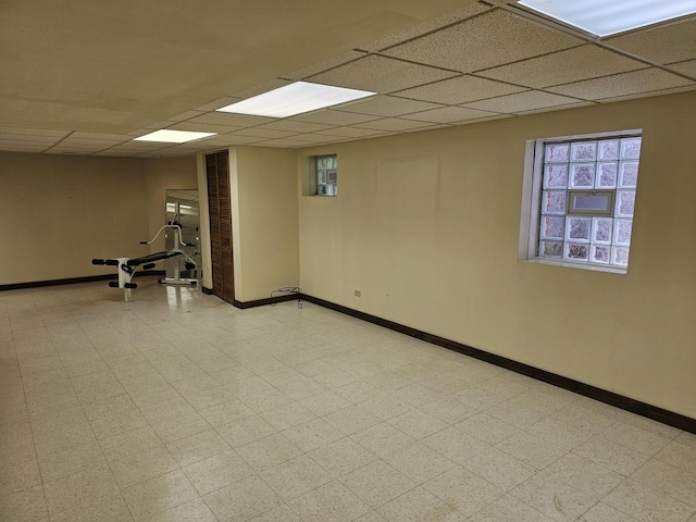 7215 Beckwith Rd, Morton Grove, IL 60053 - basement featuring a drop ceiling and light floors
