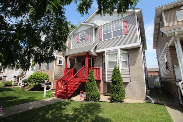 6142 W 60th St, Chicago, IL 60638 - view of front of property with brick siding and a front yard