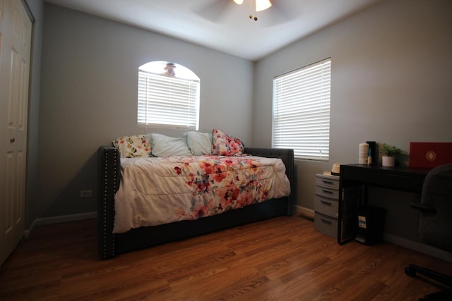 6142 W 60th St, Chicago, IL 60638 - bedroom featuring wood finished floors, a ceiling fan, and a closet
