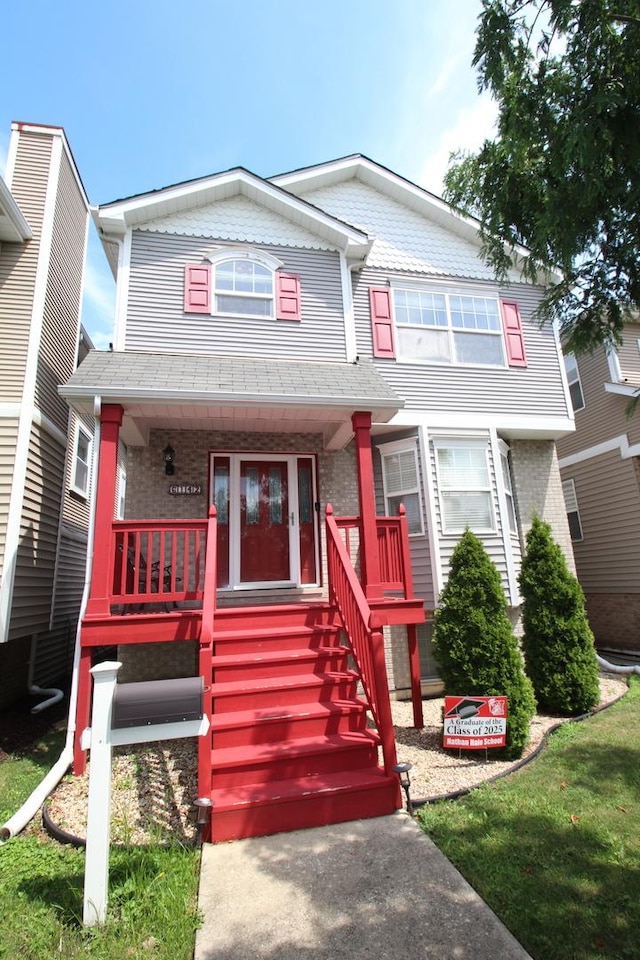 6142 W 60th St, Chicago, IL 60638 - view of front of home featuring a porch and brick siding