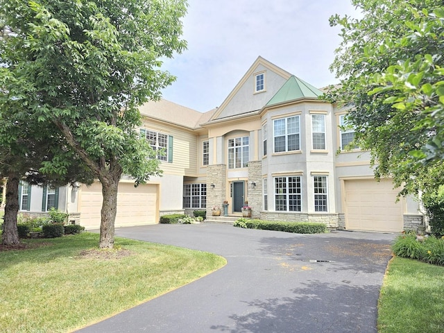 4 Forest View Dr, Hawthorn Woods, IL 60047 - view of front of home featuring stone siding, driveway, stucco siding, and a garage