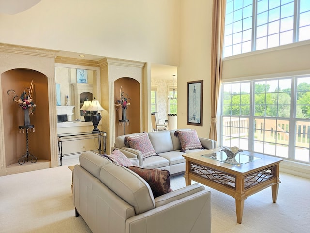 4 Forest View Dr, Hawthorn Woods, IL 60047 - carpeted living area with a towering ceiling, healthy amount of natural light, and arched walkways