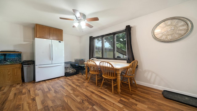 7837 Wagon Wheel Ln, Rockford, IL 61109 - dining room featuring ceiling fan and wood finished floors