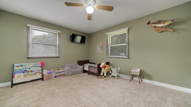 7837 Wagon Wheel Ln, Rockford, IL 61109 - playroom featuring carpet and a ceiling fan