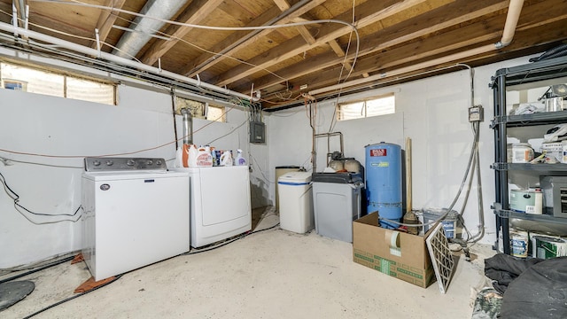 7837 Wagon Wheel Ln, Rockford, IL 61109 - below grade area featuring independent washer and dryer, a water pressure tank, and a water softener system
