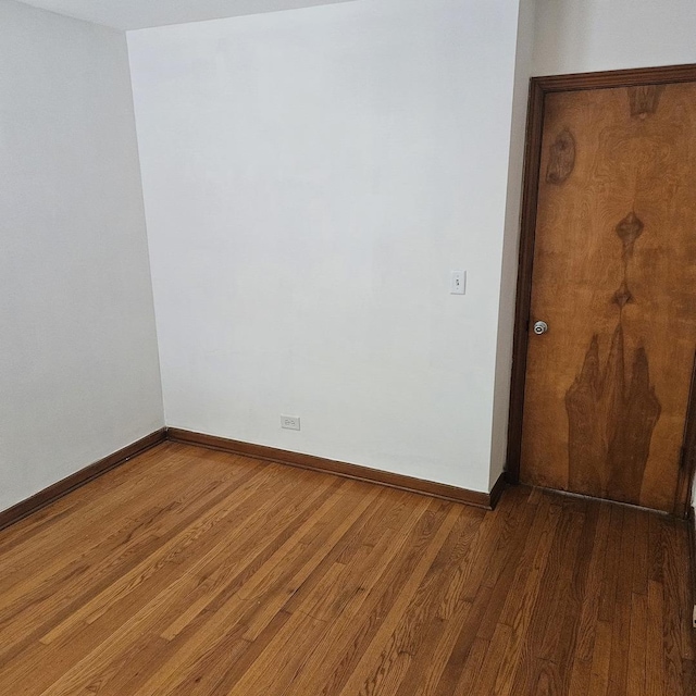 5823 W Addison St, Chicago, IL 60634 - unfurnished room with wood finished floors