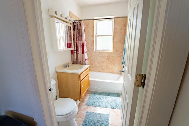 3043 N Laramie Ave Unit 2, Chicago, IL 60641 - bathroom with vanity, shower / bath combo, and tile patterned floors