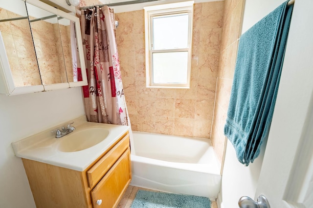 3043 N Laramie Ave Unit 2, Chicago, IL 60641 - bathroom with vanity and shower / bath combo with shower curtain