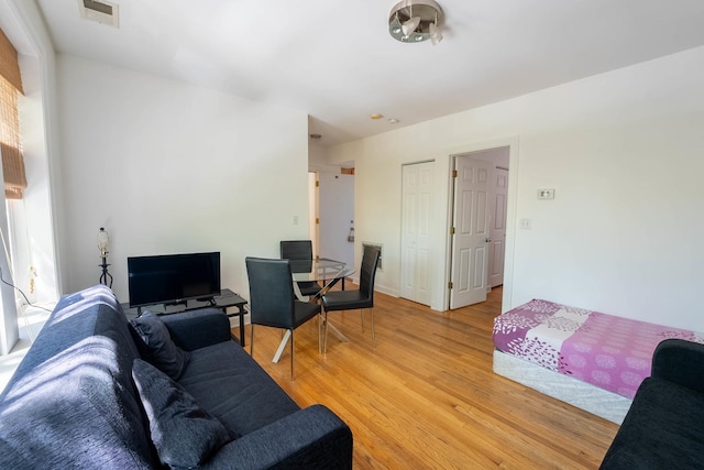 3043 N Laramie Ave Unit 2, Chicago, IL 60641 - living area featuring light wood-style flooring