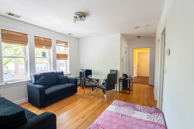 3043 N Laramie Ave Unit 2, Chicago, IL 60641 - living room with light wood finished floors