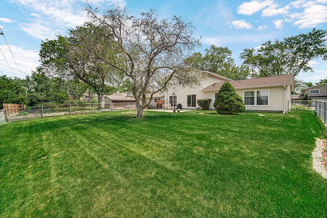 2716 Turtle Creek Dr, Hazel Crest, IL 60429 - back of house with a fenced backyard and a patio