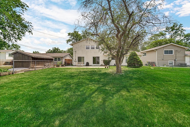 2716 Turtle Creek Dr, Hazel Crest, IL 60429 - rear view of property with a patio area and a fenced backyard