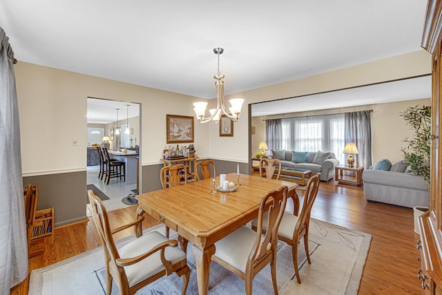 2716 Turtle Creek Dr, Hazel Crest, IL 60429 - dining room featuring a chandelier and wood finished floors