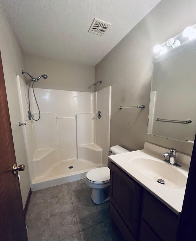 6130 N Jeffrey Ln, Oregon, IL 61061 - bathroom featuring vanity, a shower, tile patterned flooring, and a textured ceiling