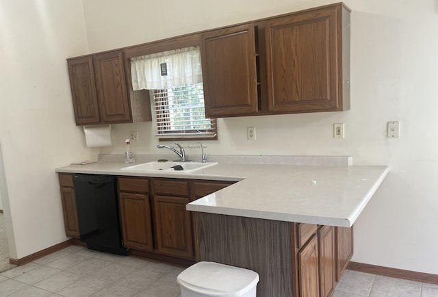 6130 N Jeffrey Ln, Oregon, IL 61061 - kitchen with dishwasher, a peninsula, light countertops, and light tile patterned floors