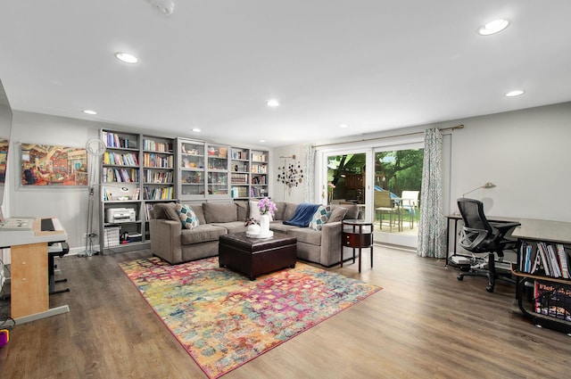 9050 Tamaroa Ter, Skokie, IL 60076 - living room with wood finished floors, a desk, and recessed lighting
