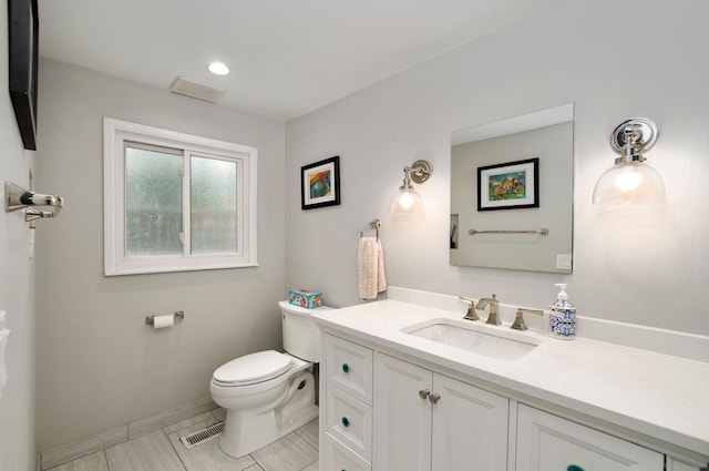 9050 Tamaroa Ter, Skokie, IL 60076 - bathroom with vanity and toilet