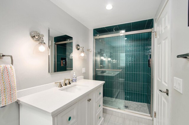 9050 Tamaroa Ter, Skokie, IL 60076 - bathroom featuring vanity, a shower stall, and tile patterned floors