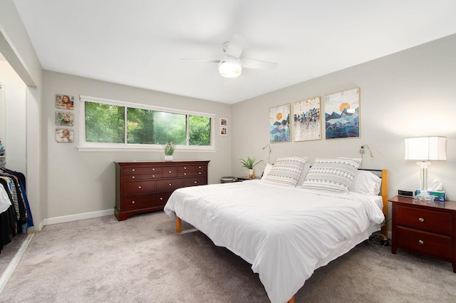 9050 Tamaroa Ter, Skokie, IL 60076 - bedroom featuring light carpet and a ceiling fan