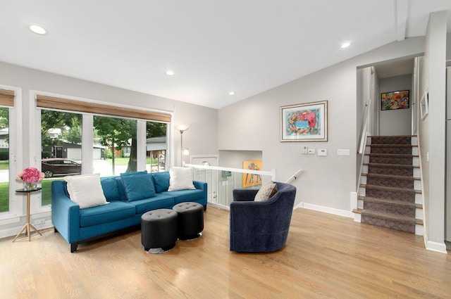 9050 Tamaroa Ter, Skokie, IL 60076 - living area featuring vaulted ceiling, light wood finished floors, and recessed lighting