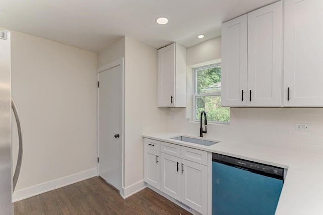 8916 S Sacramento Ave, Evergreen Park, IL 60805 - kitchen with dishwashing machine, dark wood-style flooring, light countertops, tasteful backsplash, and white cabinets