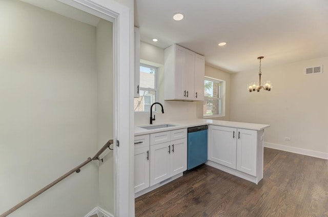 8916 S Sacramento Ave, Evergreen Park, IL 60805 - kitchen with dishwashing machine, a peninsula, a chandelier, white cabinetry, and light countertops