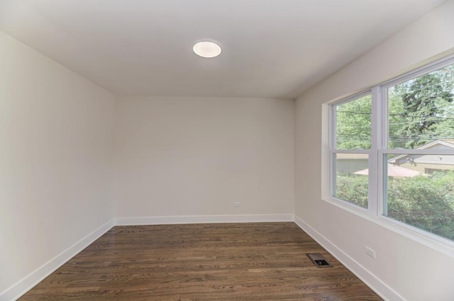 8916 S Sacramento Ave, Evergreen Park, IL 60805 - empty room with dark wood finished floors