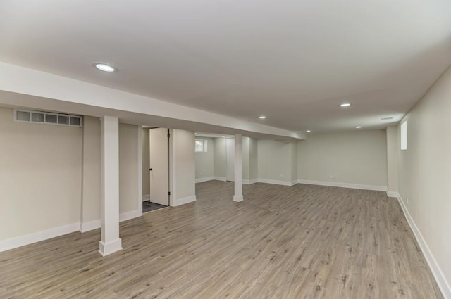 8916 S Sacramento Ave, Evergreen Park, IL 60805 - finished basement featuring light wood-style floors and recessed lighting