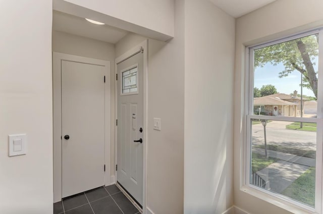 8916 S Sacramento Ave, Evergreen Park, IL 60805 - entryway featuring dark tile patterned flooring and baseboards