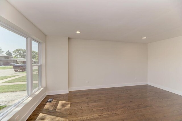 8916 S Sacramento Ave, Evergreen Park, IL 60805 - empty room with recessed lighting and dark wood-style floors